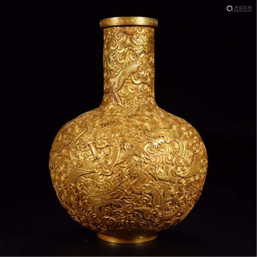 A CHINESE CARVED GILT BRONZE DRAGON VASE