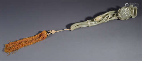 A CHINESE CARVED JADE LOTUS SCEPTER