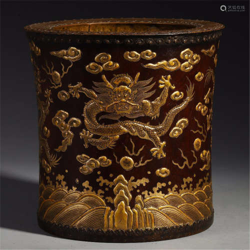 A CHINESE CARVED WOOD GOLD PAINTED DRAGON BRUSH POT