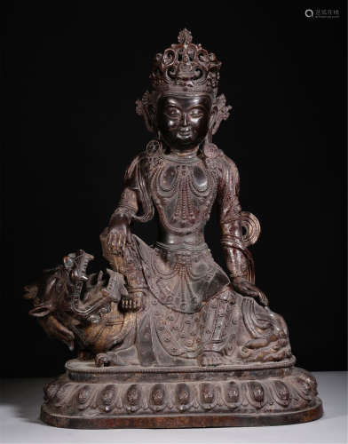 A CHINESE BRONZE SEATED GUANYIN