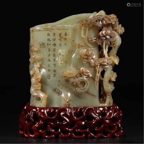 A CHINESE CARVED JADE PINE BRUSH POT