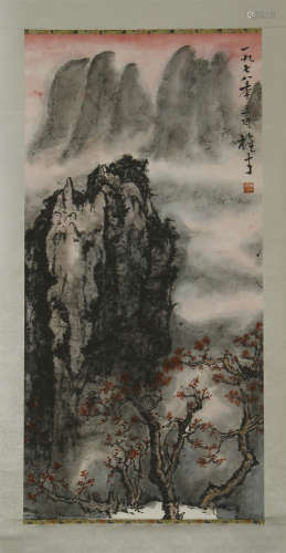 A CHINESE SCROLL PAINTING OF MOUNTAIN VIEW  WITH CALLIGRAPHY