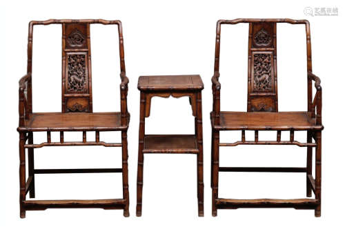 A SET OF CHINESE CARVED HUANGHUALI TABLE AND CHAIRS