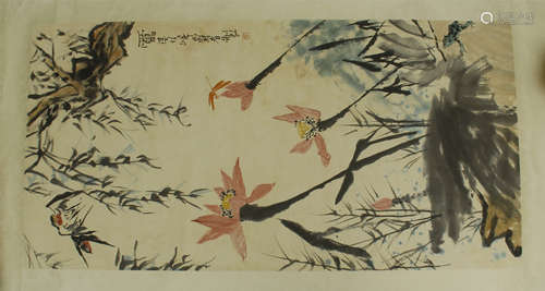 A CHINESE SCROLL PAINTING OF FLOWER WITH CALLIGRAPHY