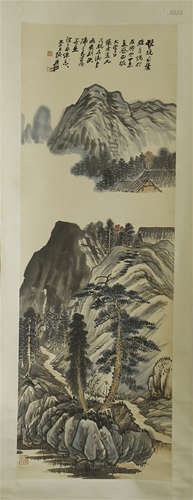 A CHINESE SCROLL PAINTING OF LANDSCAPE WITH CALLIGRAPHY