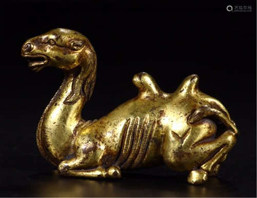 A CHINESE GILT BRONZE CAMEL PAPER WEIGHT