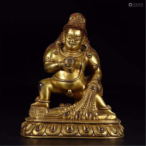 A CHINESE GILT BRONZE STANDING GOD OF WEALTH