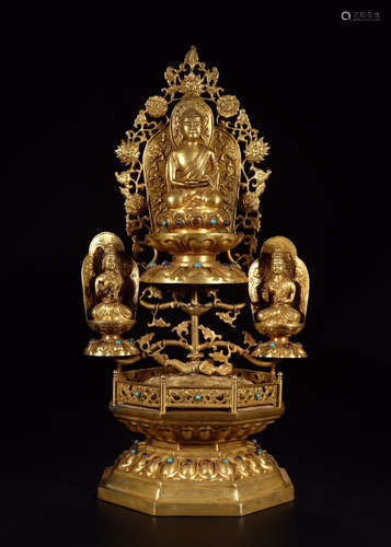 A CHINESE GILT BRONZE SEATED GUANYIN