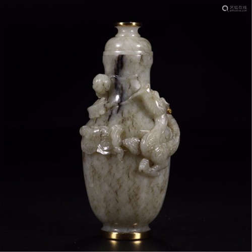 A CHINESE CARVED WHITE JADE DRAGON LIDDED VASE