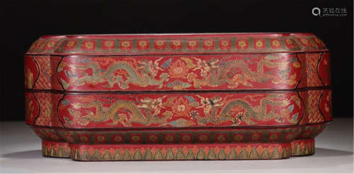 A CHINESE CARVED RED LACQUER DRAGON BOX
