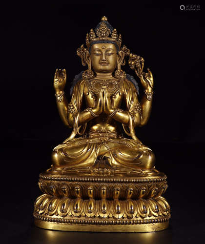 A CHINESE GILT BRONZE FOUR ARMS SEATED GUANYIN