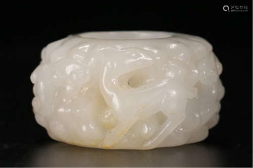 A CHINESE CARVED JADE RING