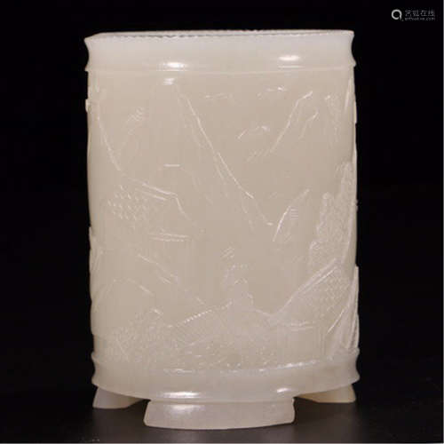 A CHINESE CARVED WHITE JADE BRUSH POT