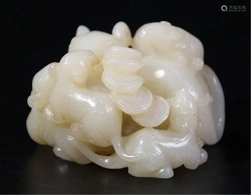 A CHINESE CARVED WHITE JADE TABLE ITEM