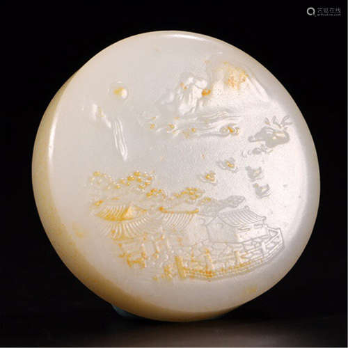 A CHINESE CARVED WHITE JADE ROUND PENDANT