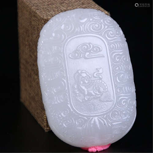 A CHINESE CARVED WHITE JADE PENDANT