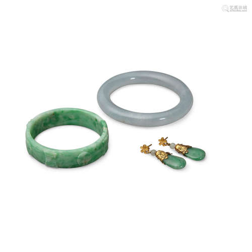 Two jade bangles and one pair of jade earrings