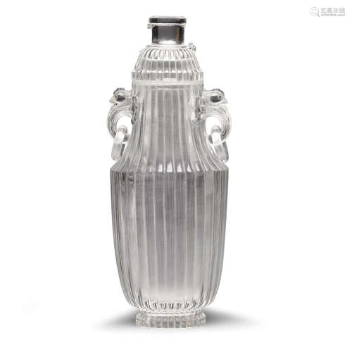 A rock crystal vase and cover with ribbed wall