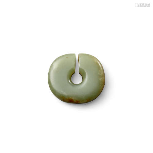 An archaistic jade slit disc