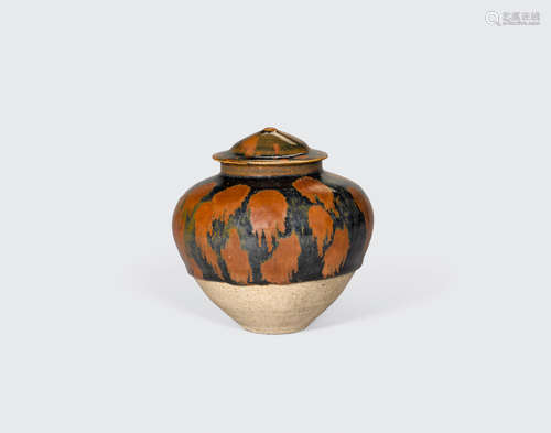 Northern Song/Jin dynasty A Cizhou-type black glazed jar and a cover with russet-splashed decoration