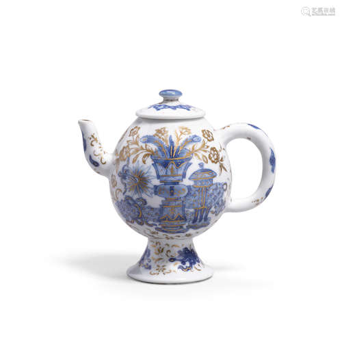 Chenghua mark, Kangxi period A blue and white and gilt decorated wine pot and cover