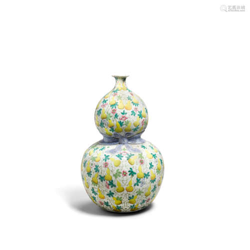 Qianlong mark, 19th century A famille rose enameled double gourd vase