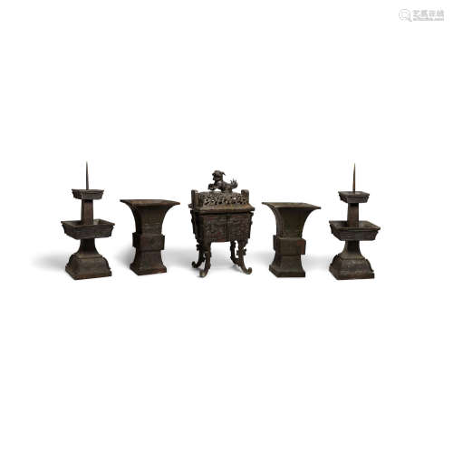 A cast bronze garniture set