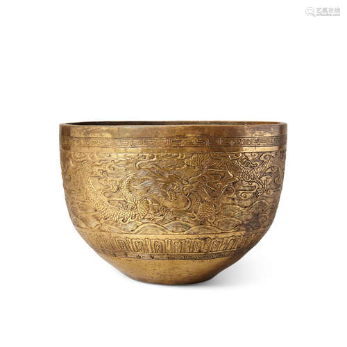 Xuande mark, Late Qing/Republic period A gilt metal alloy dragon bowl