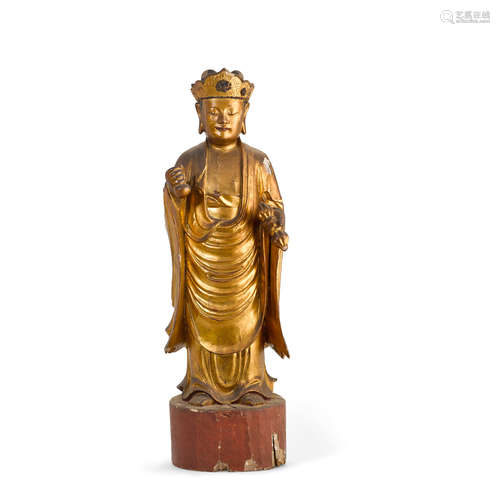 18th century A gilt and polychrome lacquered wood Buddhist figure