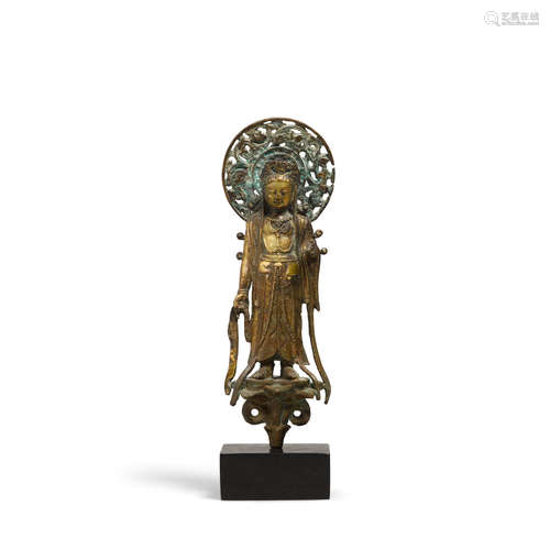 A gilt bronze figure of a Bodhisattva