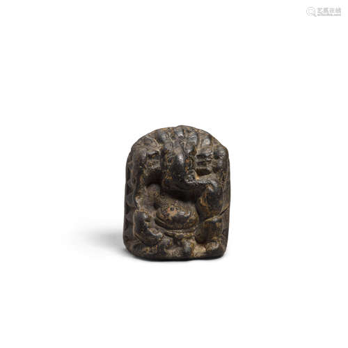 North India, possibly Kashmir, 10th/12th century A small carved stone figure of Ganesha