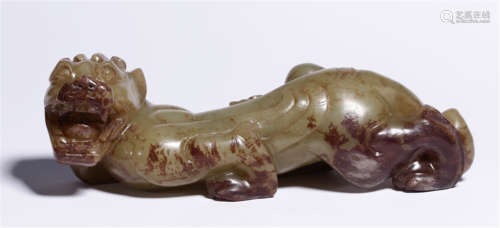 A CHINESE CARVED JADE BEAST TABLE ITEM