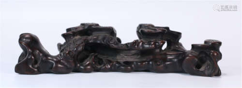 A CHINESE CARVED ZITAN PEN RACK