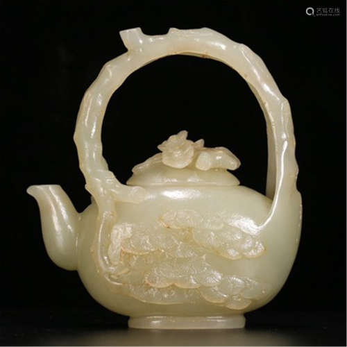 A CHINESE CARVED JADE LONG HANDLE KETTLE