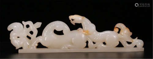 A CHINESE CARVED JADE MAN AND HORSE TABLE ITEM