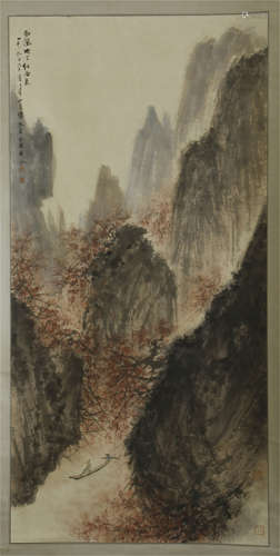 A CHINESE SCROLL PAINTING OF MOUNTAIN VIEW WITH CALLIGRAPHY