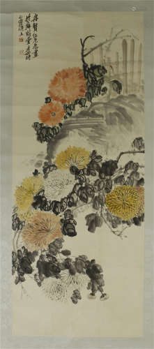 A CHINESE SCROLL PAINTING OF FLOWER WITH CALLIGRAPHY