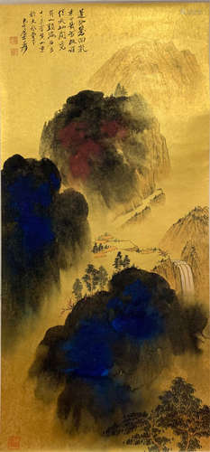 A CHINESE SCROLL PAINTING OF MOUNTAIN VIEW WITH CALLIGRAPHY