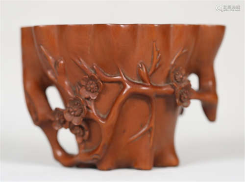 A CHINESE CARVED BOXWOOD FLOWER CUP