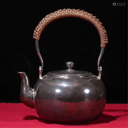 A CHINESE SILVER LONG HANDLE TEA POT