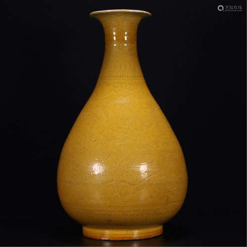 A CHINESE PORCELAIN CARVED YELLOW GLAZED CLOUD CRANE VASE