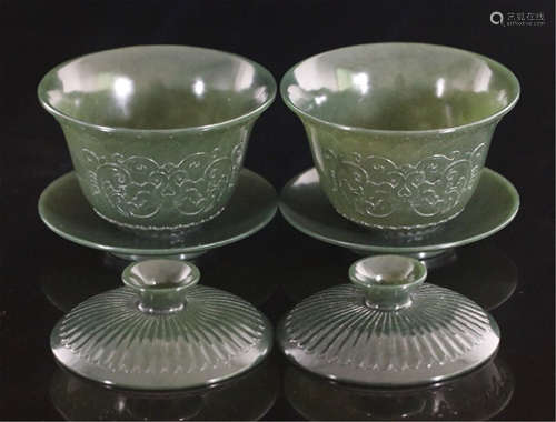 A PAIR OF CHINESE CARVED JADE LIDDED BOWLS