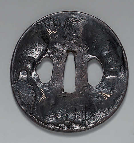 Hammered iron Tsuba, decorated with a samurai chas…
