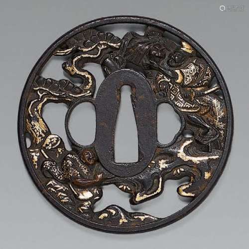 Tsuba in openwork iron and heightened with gold re…