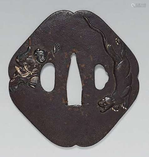 Iron Tsuba with relief decoration of a child and a…