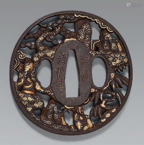 Tsuba in openwork iron, enhanced with gold, silver…