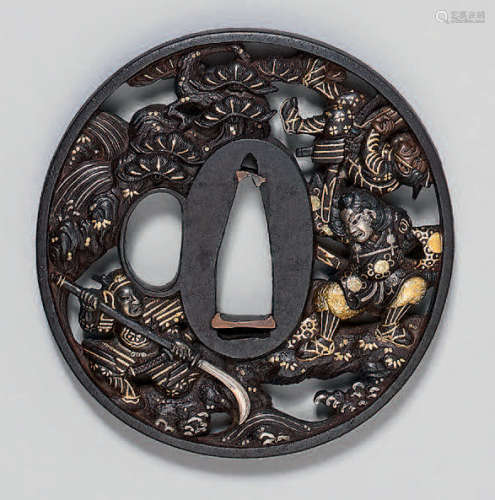 Tsuba in openwork iron, enhanced with gold, silver…