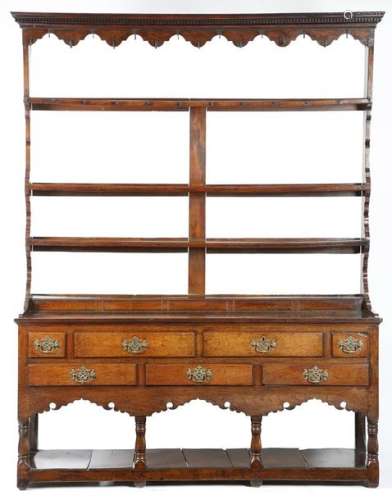 A George III Welsh oak dresser, the raised plate r…