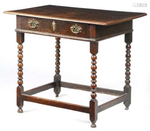A William and Mary oak side table, the boarded top…