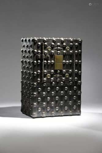 A studded iron safe, all over strap and rivet deco…